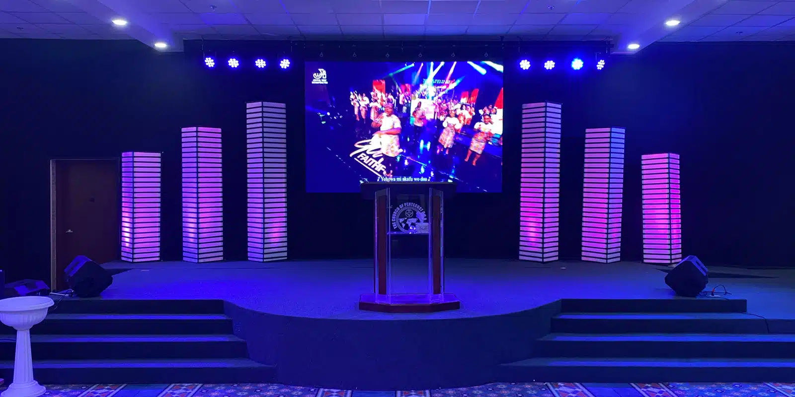 Worship stage setup with LED display and lighting